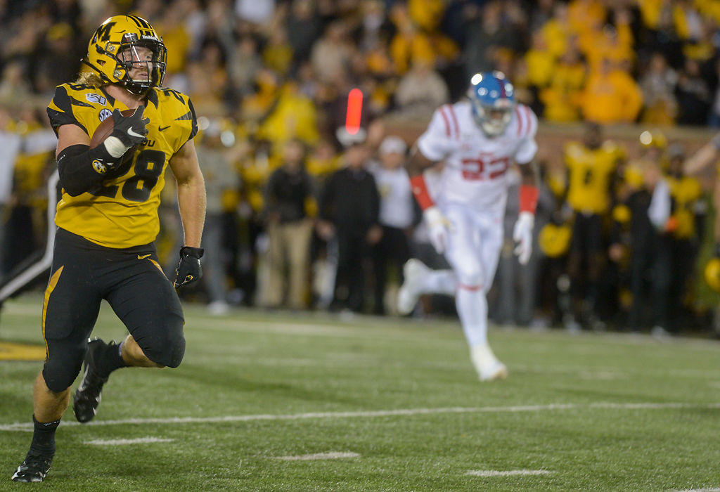Missouri running back Dawson Downing sprints down the field